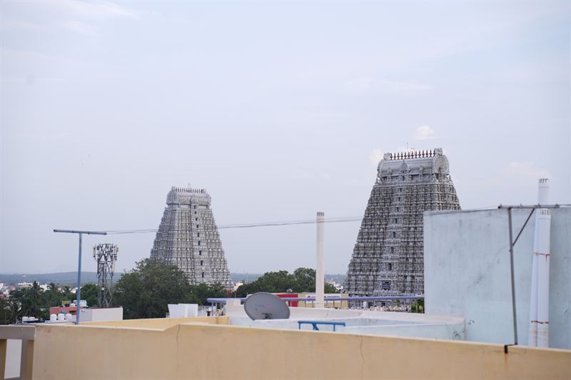 Two temple gopurams seen from the rooftop